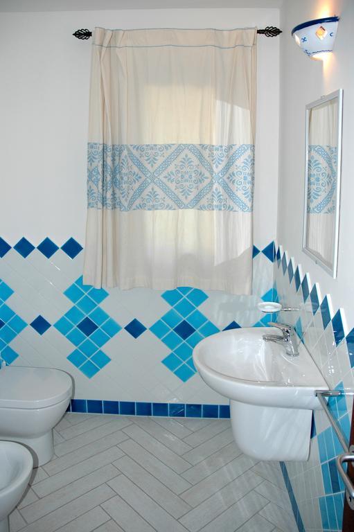 Holiday Homes Stella Marina Сан-Теодоро Номер фото
